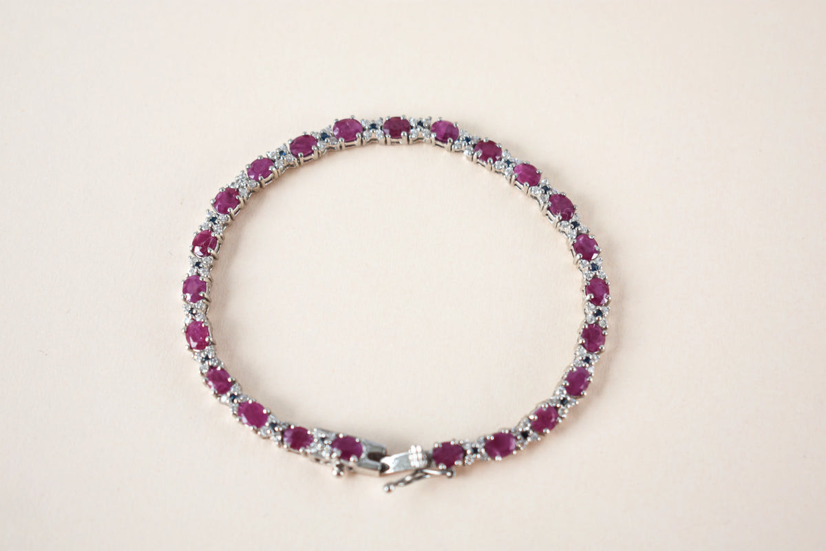 Ruby and cubic zirconia tennis bracelet with round stones set in 925 silver