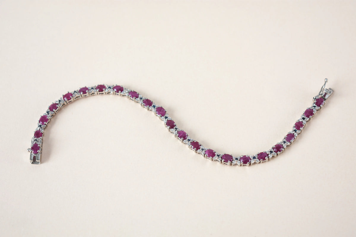 Ruby and cubic zirconia tennis bracelet with round stones set in 925 silver