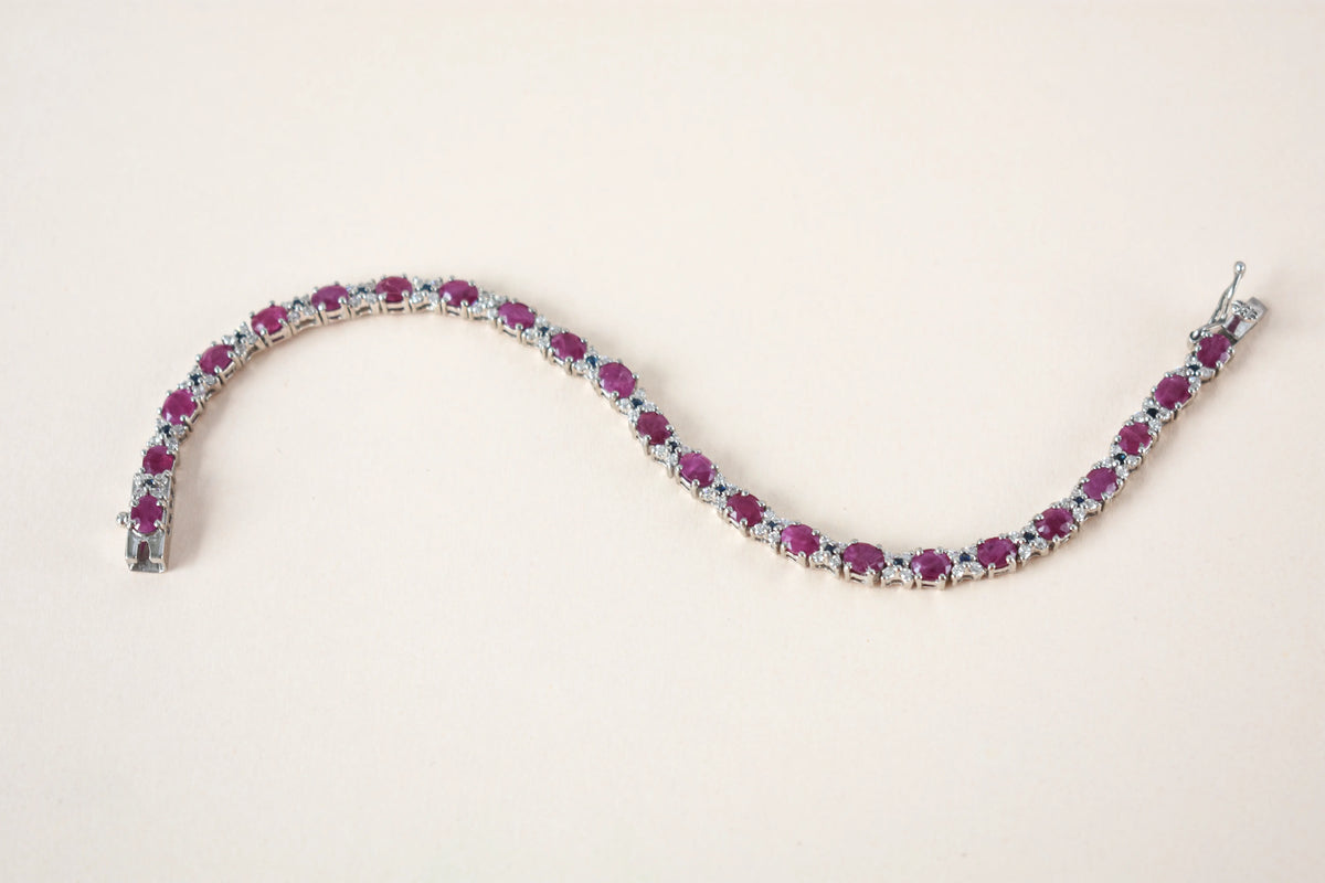 Ruby and cubic zirconia tennis bracelet with round stones set in 925 silver
