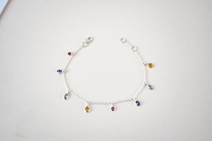 Multi gemstone dangle bracelet with pear-cut colored stones on a 925 silver chain