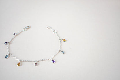 Multi gemstone dangle bracelet with pear-cut colored stones on a 925 silver chain