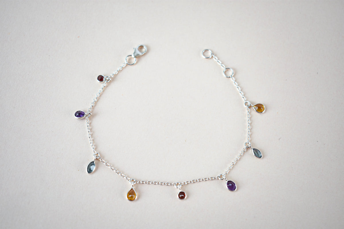 Multi gemstone dangle bracelet with pear-cut colored stones on a 925 silver chain