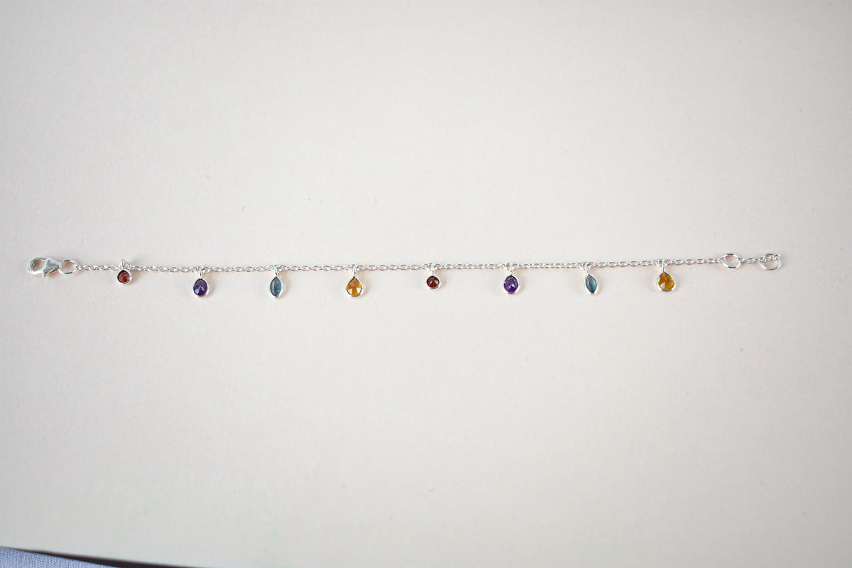 Multi gemstone dangle bracelet with pear-cut colored stones on a 925 silver chain