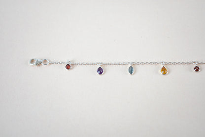 Multi gemstone dangle bracelet with pear-cut colored stones on a 925 silver chain