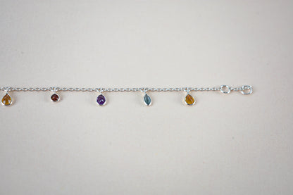 Multi gemstone dangle bracelet with pear-cut colored stones on a 925 silver chain