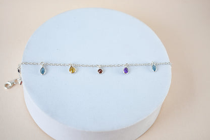Multi gemstone dangle bracelet with pear-cut colored stones on a 925 silver chain