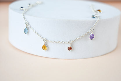 Multi gemstone dangle bracelet with pear-cut colored stones on a 925 silver chain