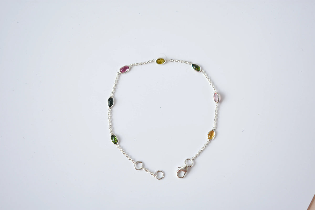 Multi tourmaline by the yard bracelet with bezel-set stones on a 925 silver chain