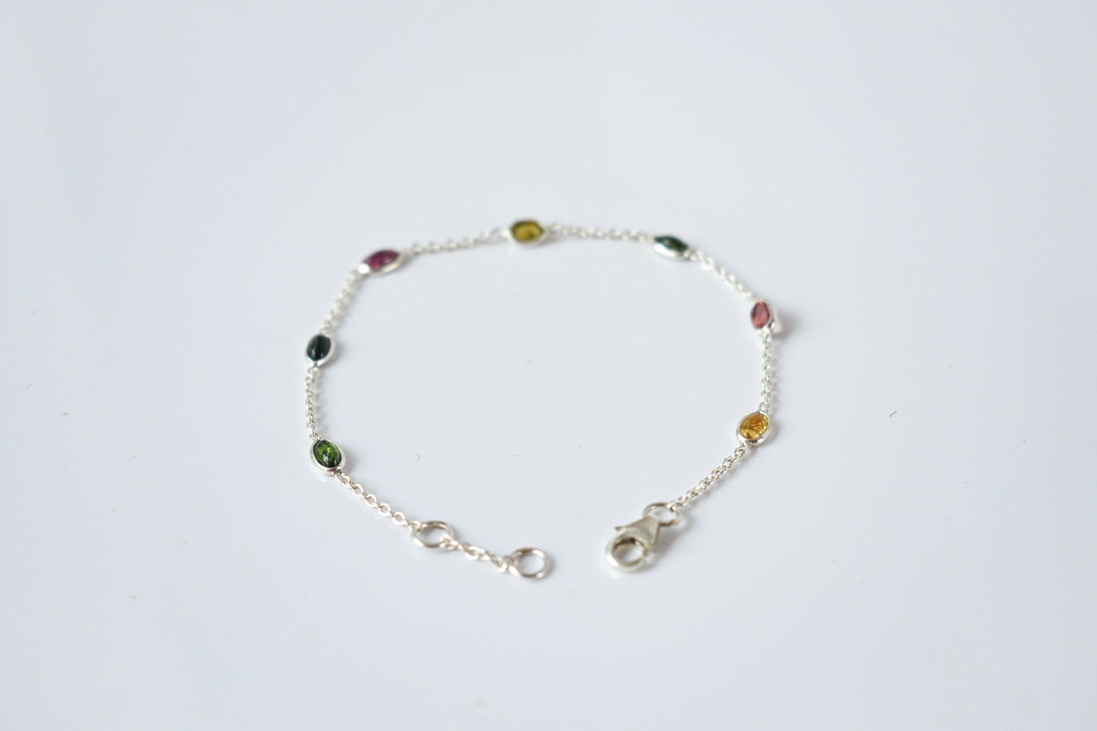 Multi tourmaline by the yard bracelet with bezel-set stones on a 925 silver chain
