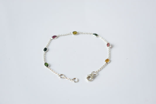 Multi tourmaline by the yard bracelet with bezel-set stones on a 925 silver chain