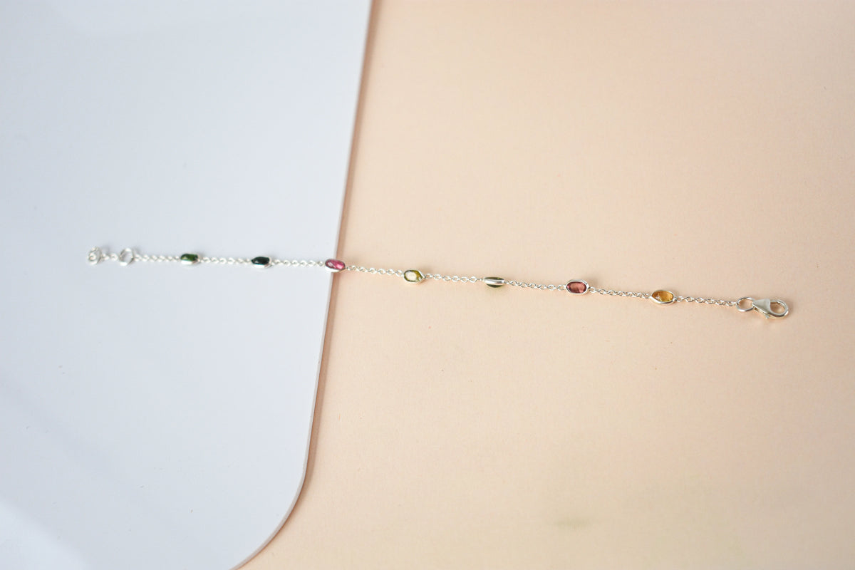 Multi tourmaline by the yard bracelet with bezel-set stones on a 925 silver chain