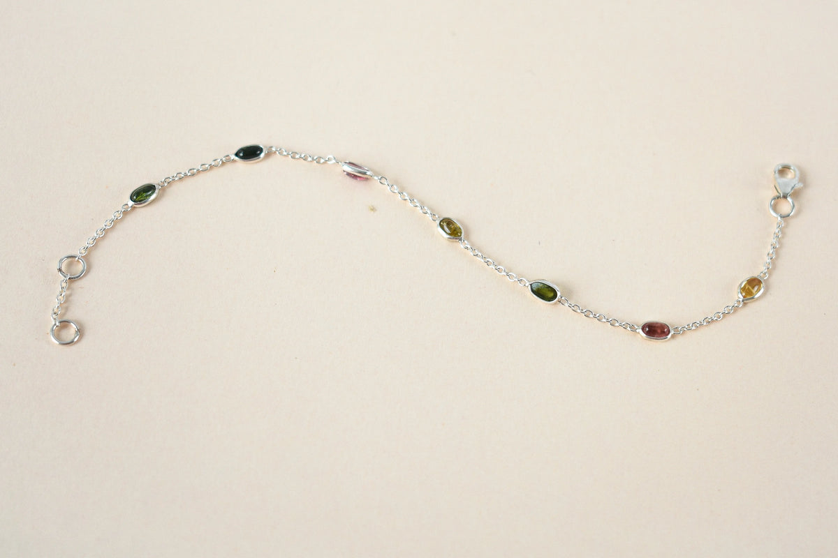 Multi tourmaline by the yard bracelet with bezel-set stones on a 925 silver chain
