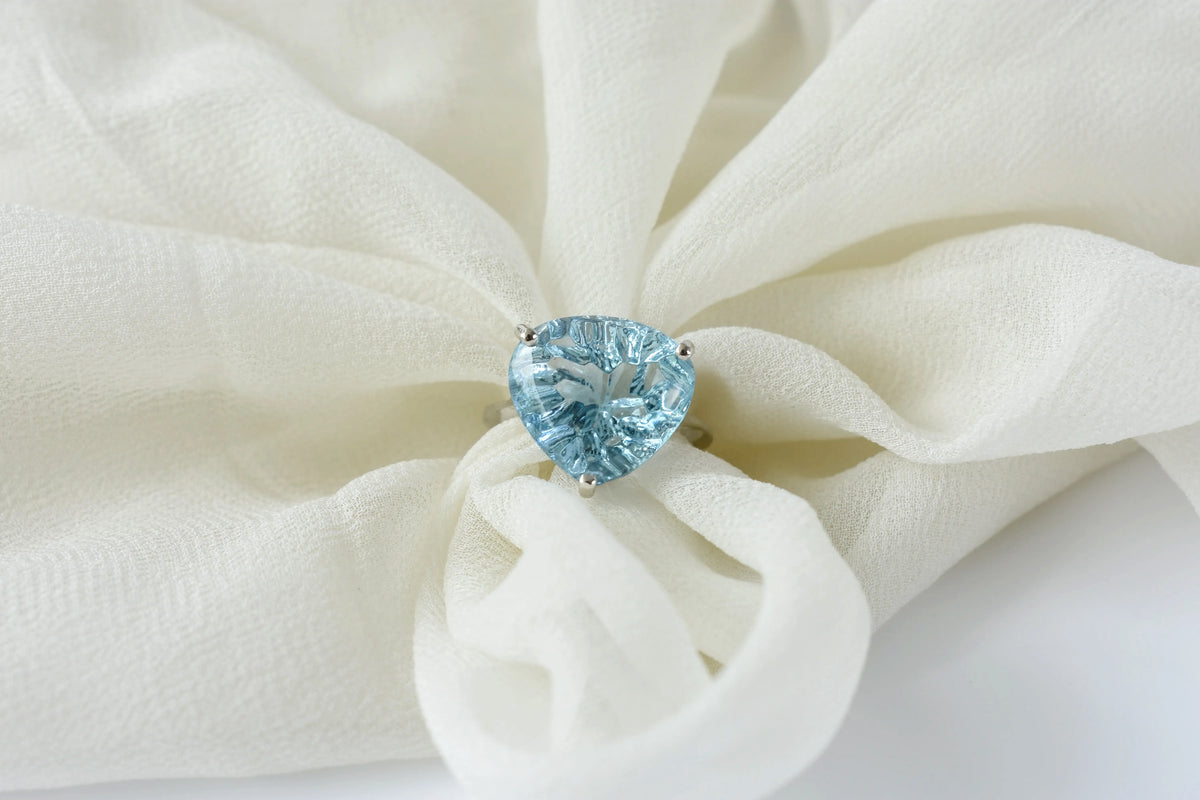 Sky blue topaz trillion-cut solitaire ring in 925 silver