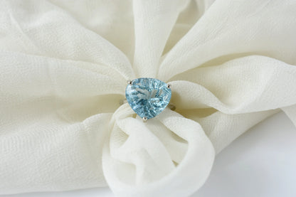 Sky blue topaz trillion-cut solitaire ring in 925 silver