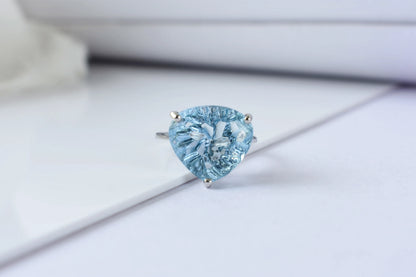 Sky blue topaz trillion-cut solitaire ring in 925 silver