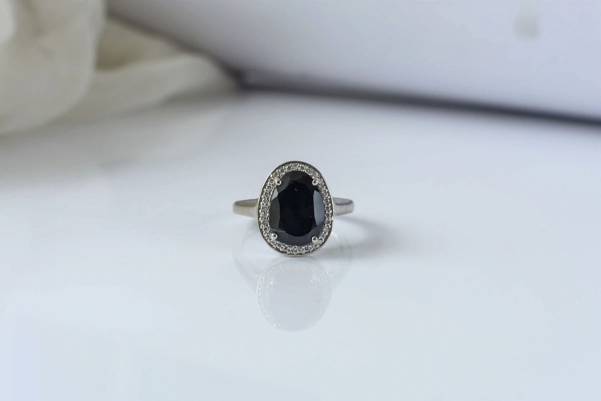 Black onyx oval halo ring in 925 silver