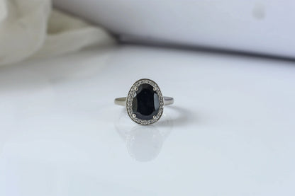 Black onyx oval halo ring in 925 silver