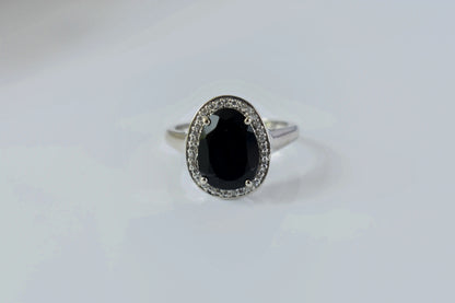 Black onyx oval halo ring in 925 silver