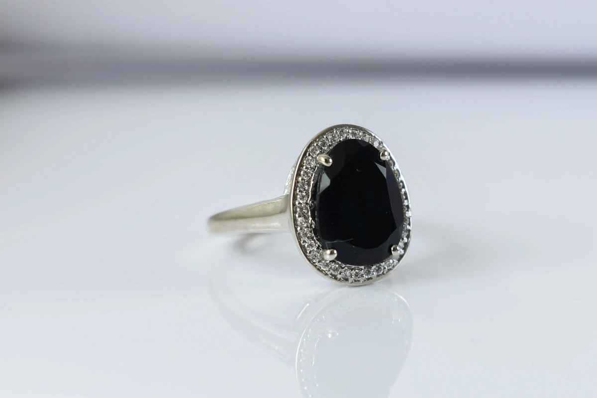 Black onyx oval halo ring in 925 silver
