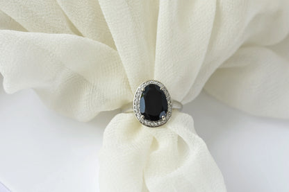 Black onyx oval halo ring in 925 silver