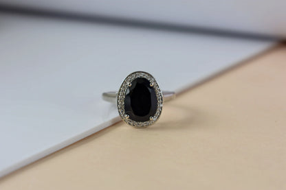 Black onyx oval halo ring in 925 silver