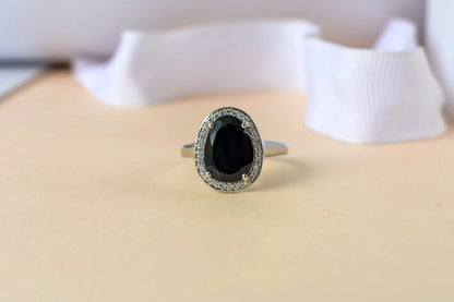 Black onyx oval halo ring in 925 silver