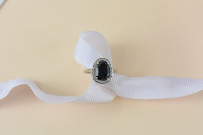Black onyx oval halo ring in 925 silver