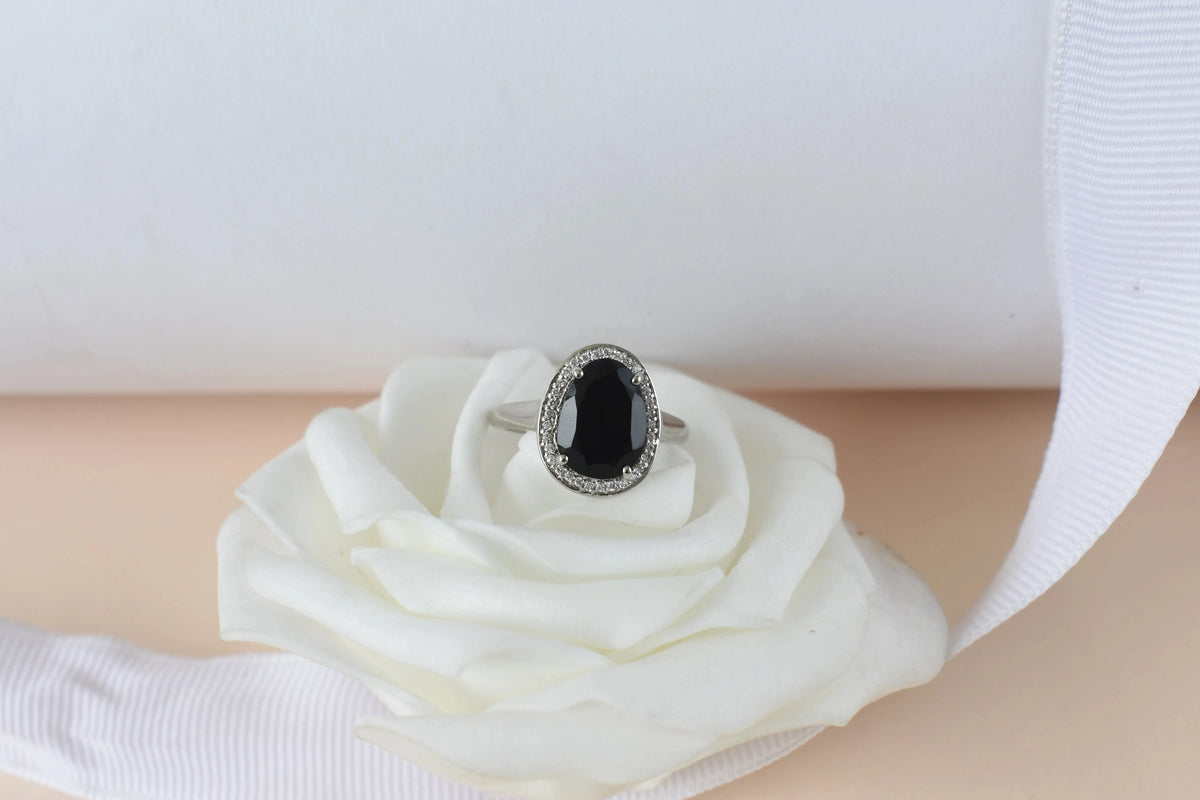 Black onyx oval halo ring in 925 silver