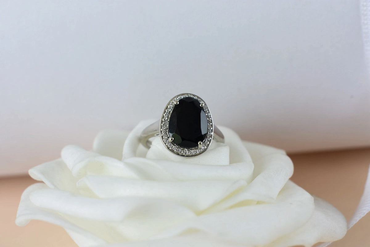 Black onyx oval halo ring in 925 silver