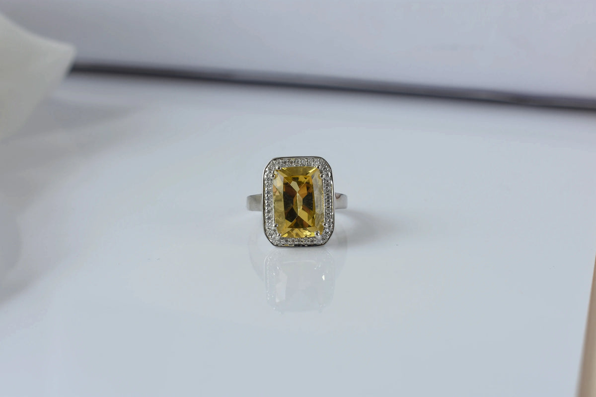 Citrine emerald-cut halo ring in 925 silver