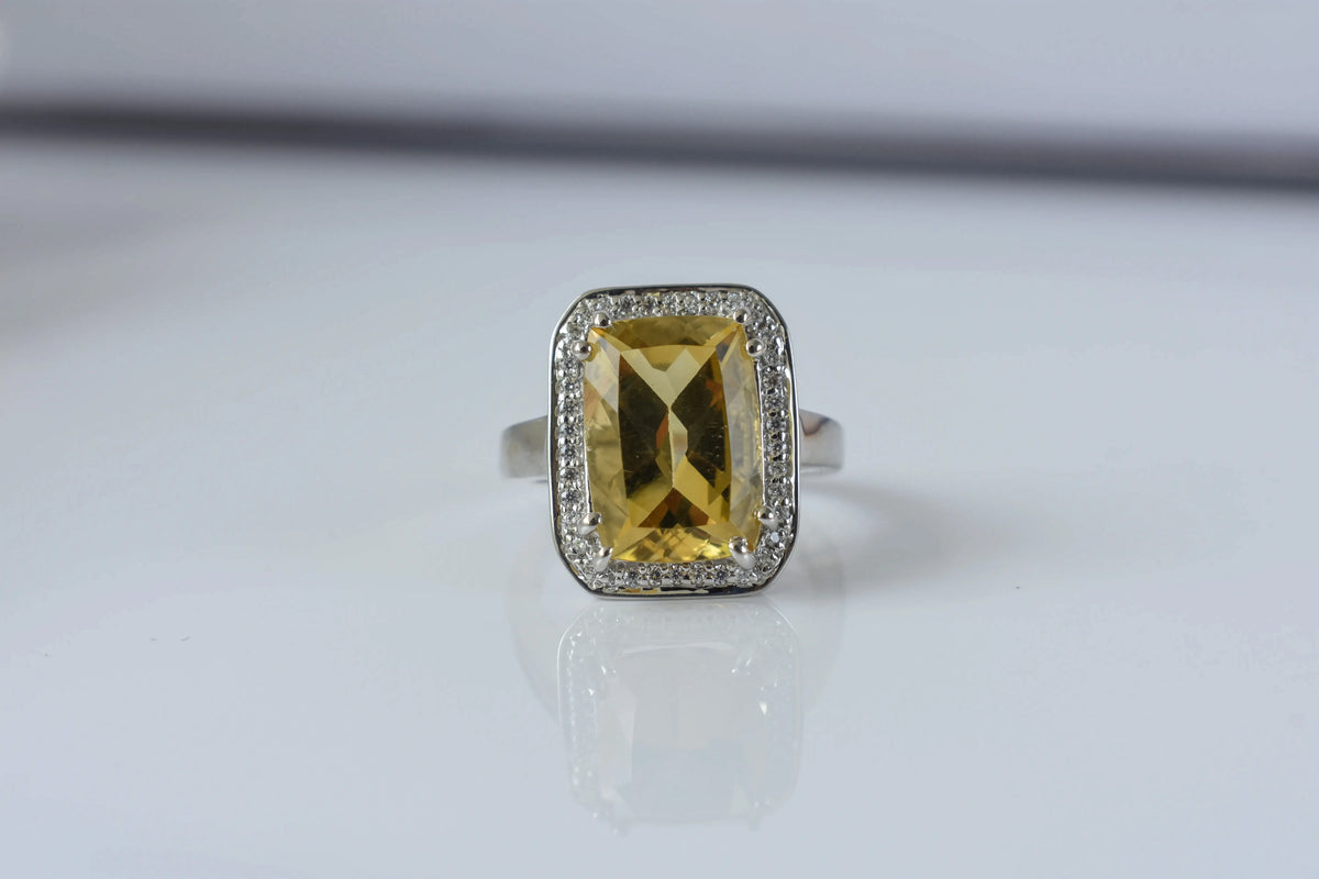 Citrine emerald-cut halo ring in 925 silver