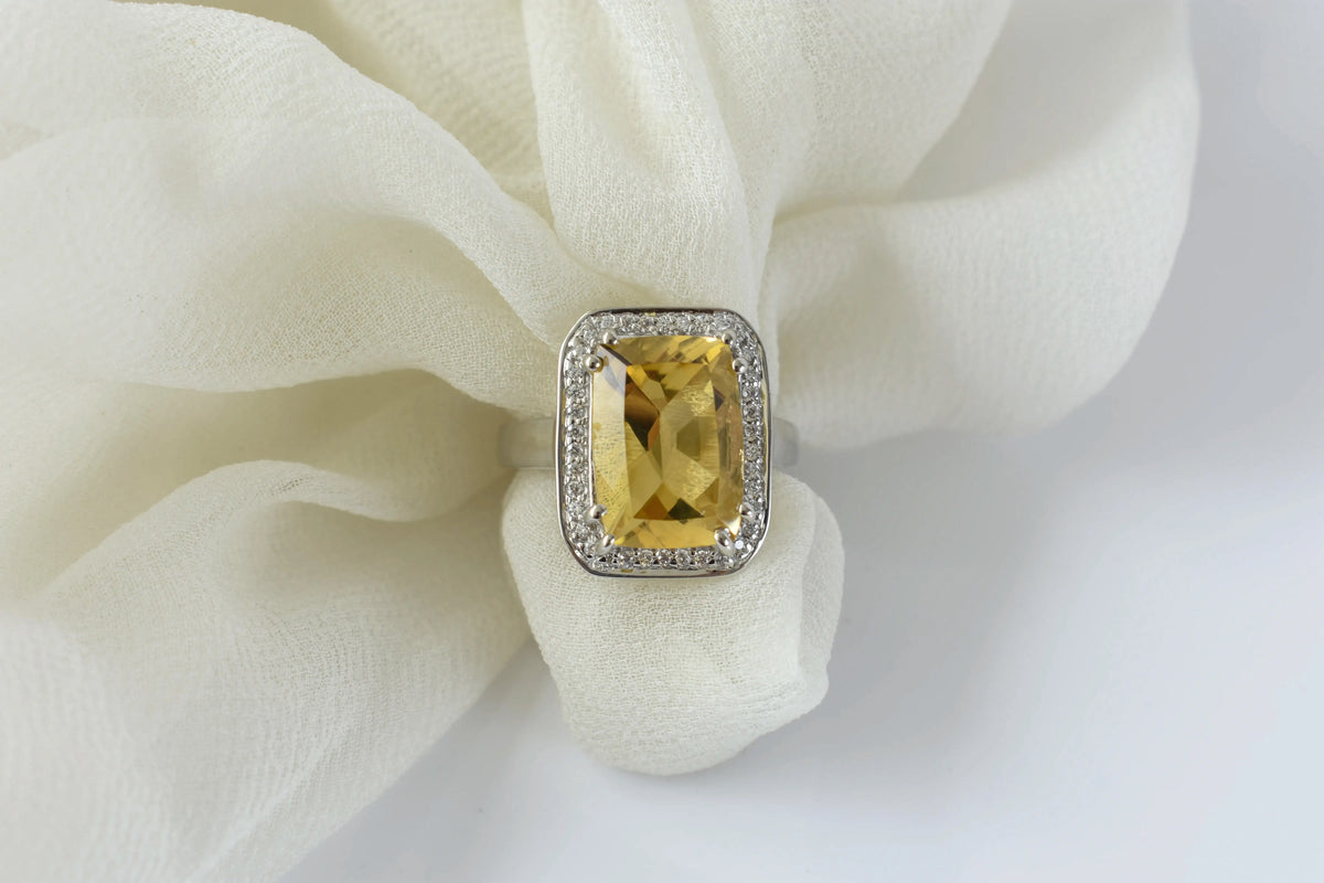 Citrine emerald-cut halo ring in 925 silver