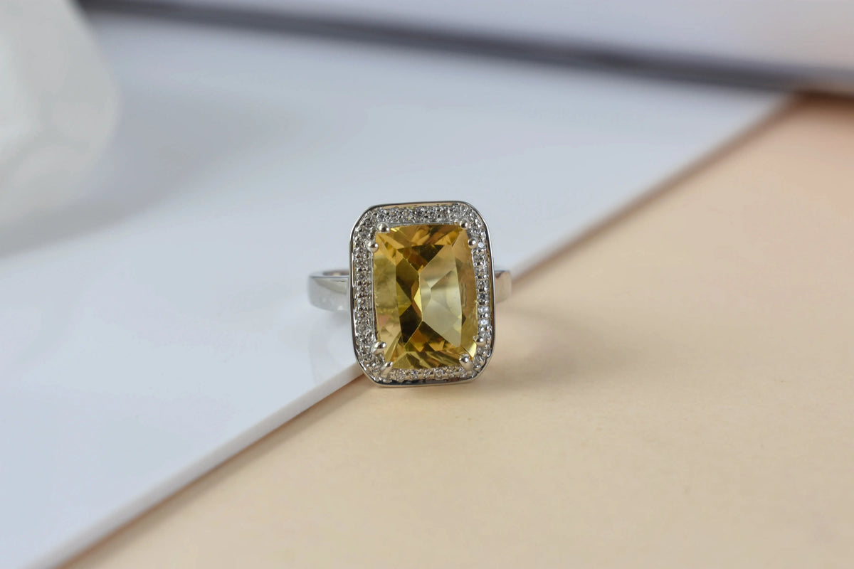 Citrine emerald-cut halo ring in 925 silver