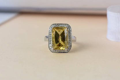 Citrine emerald-cut halo ring in 925 silver
