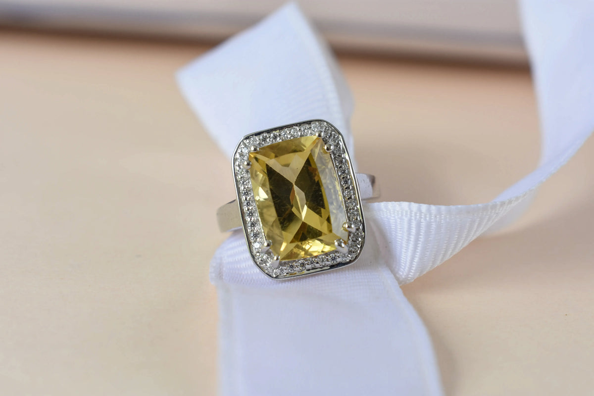 Citrine emerald-cut halo ring in 925 silver