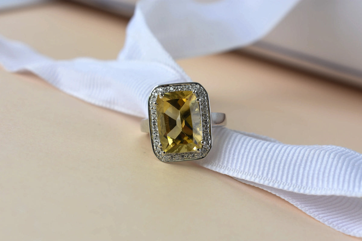 Citrine emerald-cut halo ring in 925 silver
