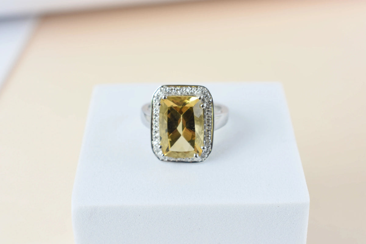 Citrine emerald-cut halo ring in 925 silver