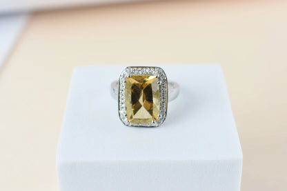 Citrine emerald-cut halo ring in 925 silver