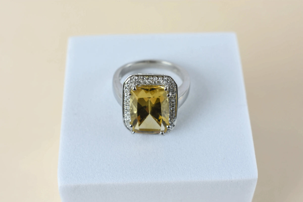 Citrine emerald-cut halo ring in 925 silver
