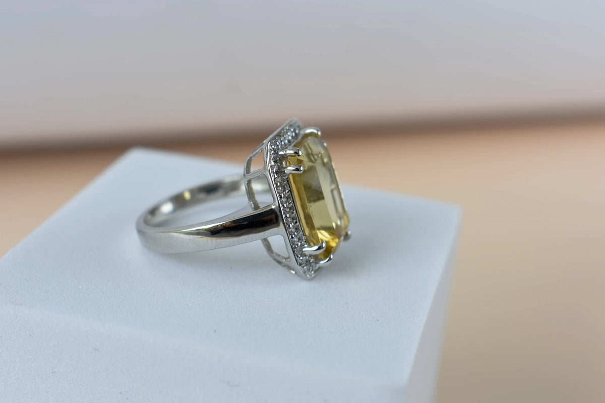 Citrine emerald-cut halo ring in 925 silver