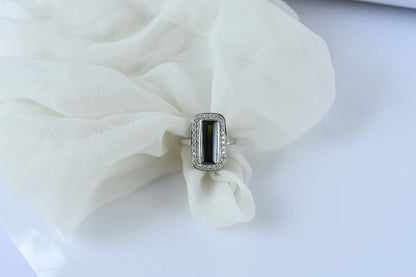 Green tourmaline emerald-cut halo ring in 925 silver
