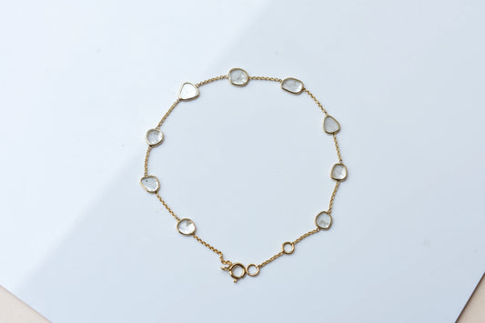 18K gold bracelet with uncut polki diamond slices set by the yard
