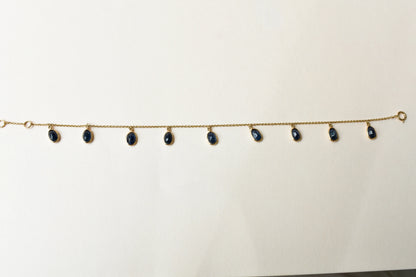 18K gold bracelet with blue sapphire drops in fringe design