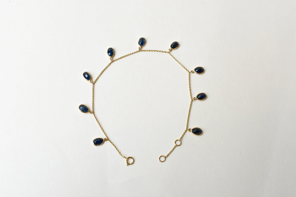 18K gold bracelet with blue sapphire drops in fringe design