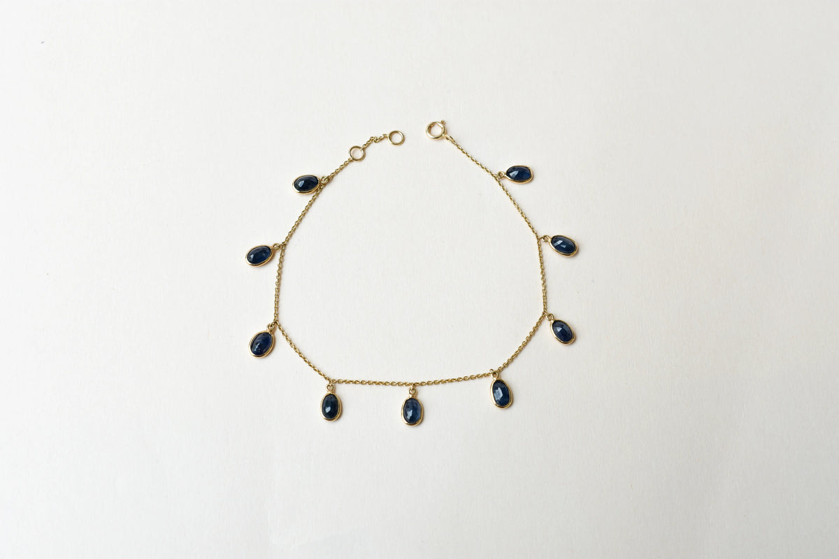 18K gold bracelet with blue sapphire drops in fringe design