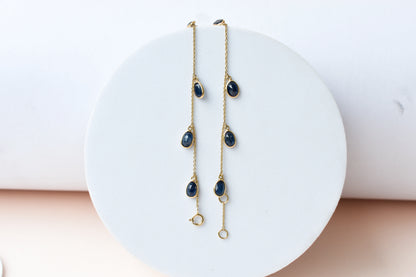 18K gold bracelet with blue sapphire drops in fringe design