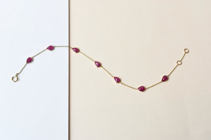 10K gold bracelet with pear-cut ruby drops