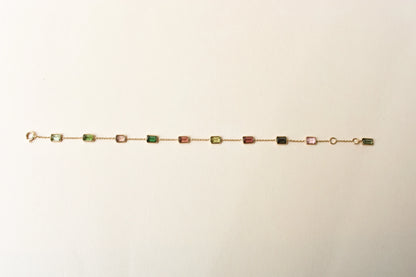 18K gold bracelet with emerald-cut pink and green tourmaline stations