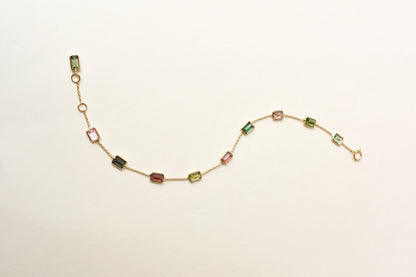 18K gold bracelet with emerald-cut pink and green tourmaline stations