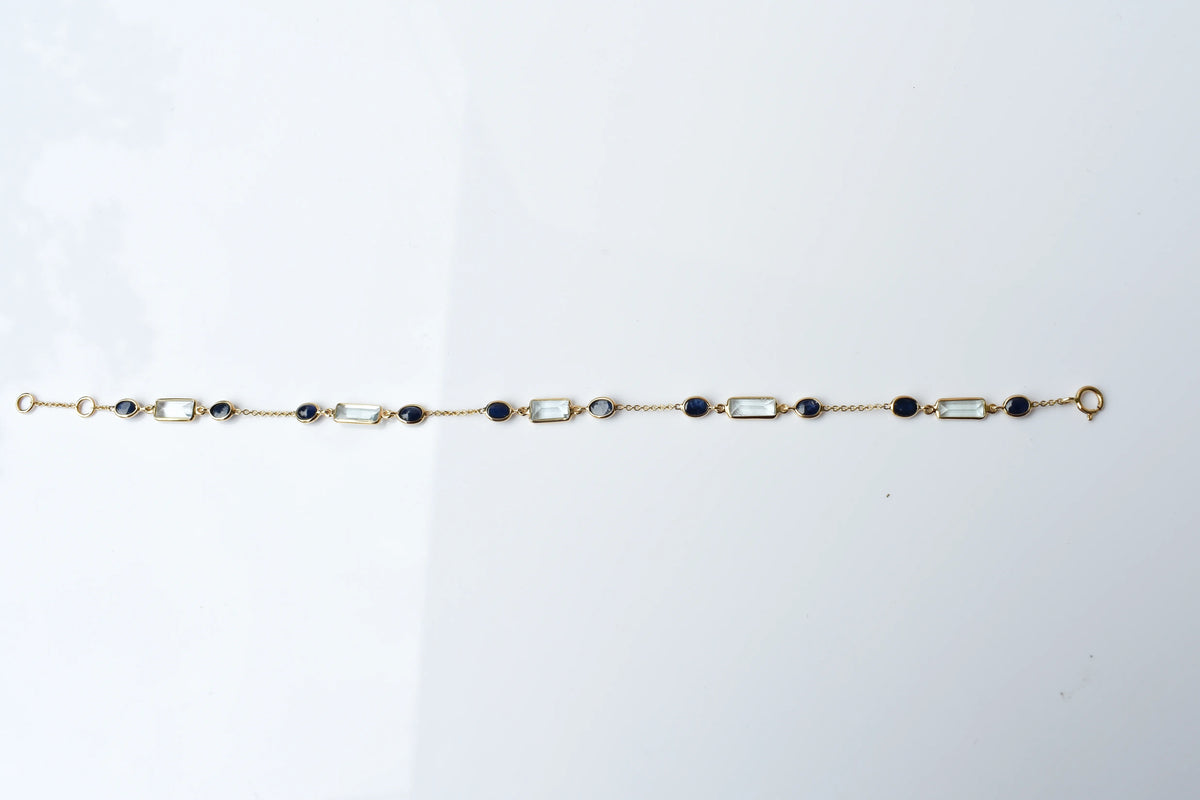 18K gold bracelet with aquamarine and blue sapphire stations